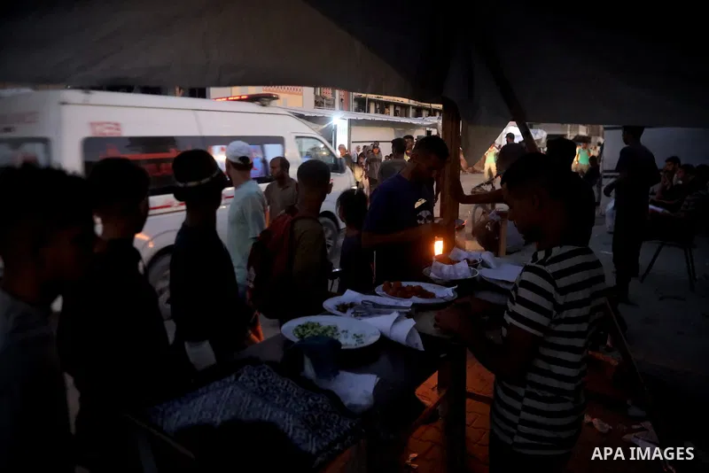 Palestinians, deprived of basic necessities such as shelter, food, and clean water due to ongoing Israeli attacks, buy falafel from street vendors, as it is currently the most affordable and available food option amid se...