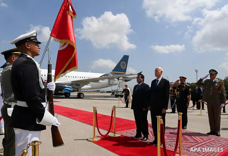 Tunisian President, Kais Saied, receives Libyan Presidential Council Chairman Mohamed Younis Menfi at Tunis-Carthage International Airport in Tunisia on August 18, 2025. Photo by Tunisian Presidency\ apaimages