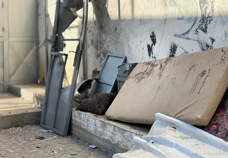 Palestinians inspect the destruction inside Al-Awda hospital in Nusairat Camp, Gaza Strip, following an Israeli strike on September 30, 2025. Photo by Belal Abu Amer \ apaimages