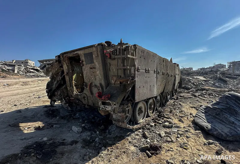 A view of damaged military vehicles used by the Israeli army during the attacks, after Israeli forces withdrew from Gaza following the ceasefire between Israel and Hamas, in Gaza City, Gaza on October 30, 2025. Photo by...