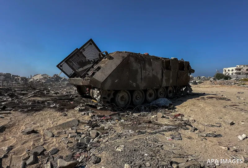 A view of damaged military vehicles used by the Israeli army during the attacks, after Israeli forces withdrew from Gaza following the ceasefire between Israel and Hamas, in Gaza City, Gaza on October 30, 2025. Photo by...