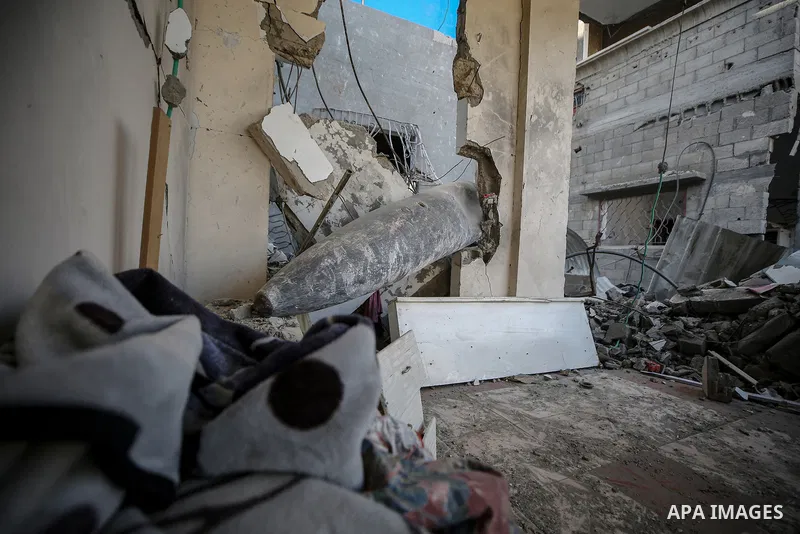 An unexploded bomb remains in the home of the Al-Hatu family in the Al-Nafaq neighborhood of Gaza City on October 31, 2025. The Mark 84 (MK-84) bomb, a free-fall weapon capable of destroying entire buildings or causing e...