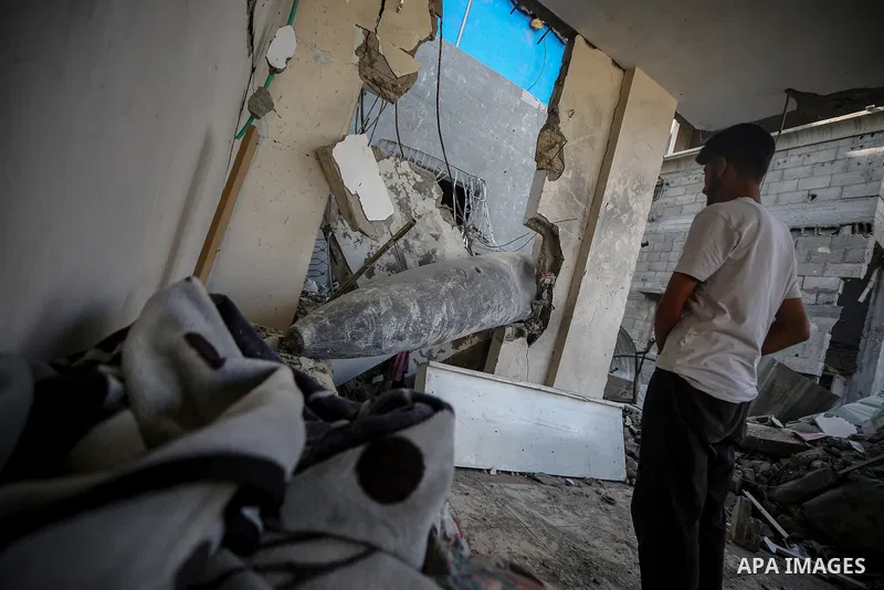 An unexploded bomb remains in the home of the Al-Hatu family in the Al-Nafaq neighborhood of Gaza City on October 31, 2025. The Mark 84 (MK-84) bomb, a free-fall weapon capable of destroying entire buildings or causing e...