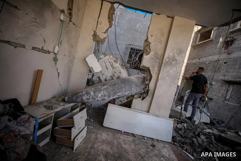 An unexploded bomb remains in the home of the Al-Hatu family in the Al-Nafaq neighborhood of Gaza City on October 31, 2025. The Mark 84 (MK-84) bomb, a free-fall weapon capable of destroying entire buildings or causing e...