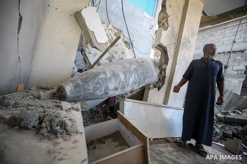An unexploded bomb remains in the home of the Al-Hatu family in the Al-Nafaq neighborhood of Gaza City on October 31, 2025. The Mark 84 (MK-84) bomb, a free-fall weapon capable of destroying entire buildings or causing e...