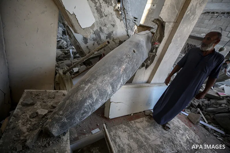 An unexploded bomb remains in the home of the Al-Hatu family in the Al-Nafaq neighborhood of Gaza City on October 31, 2025. The Mark 84 (MK-84) bomb, a free-fall weapon capable of destroying entire buildings or causing e...