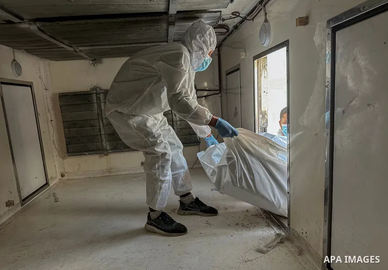 Red Cross teams deliver the bodies of 30 Palestinians, who were detained by Israeli forces from different parts of Gaza during the war and handed over as part of the ceasefire deal, to Nasser Hospital in Khan Yunis, Gaza...
