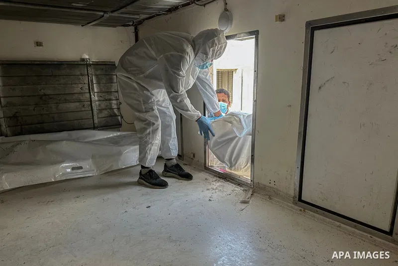 Red Cross teams deliver the bodies of 30 Palestinians, who were detained by Israeli forces from different parts of Gaza during the war and handed over as part of the ceasefire deal, to Nasser Hospital in Khan Yunis, Gaza...