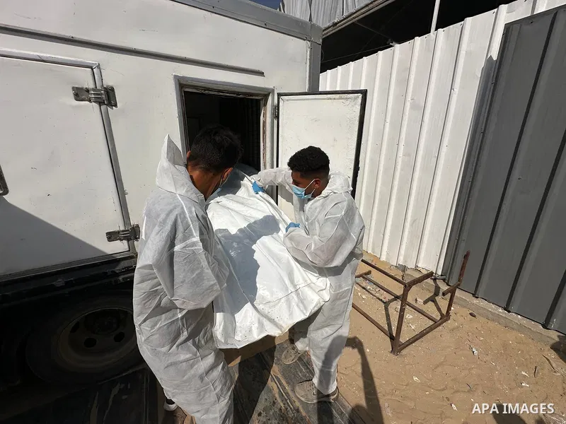 Red Cross teams deliver the bodies of 30 Palestinians, who were detained by Israeli forces from different parts of Gaza during the war and handed over as part of the ceasefire deal, to Nasser Hospital in Khan Yunis, Gaza...