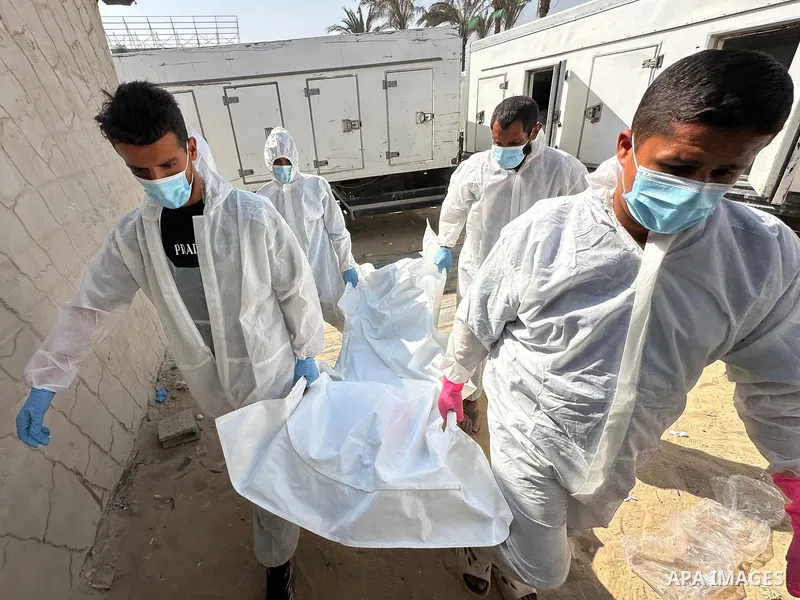 Red Cross teams deliver the bodies of 30 Palestinians, who were detained by Israeli forces from different parts of Gaza during the war and handed over as part of the ceasefire deal, to Nasser Hospital in Khan Yunis, Gaza...