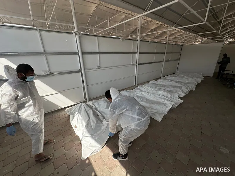 Red Cross teams deliver the bodies of 30 Palestinians, who were detained by Israeli forces from different parts of Gaza during the war and handed over as part of the ceasefire deal, to Nasser Hospital in Khan Yunis, Gaza...