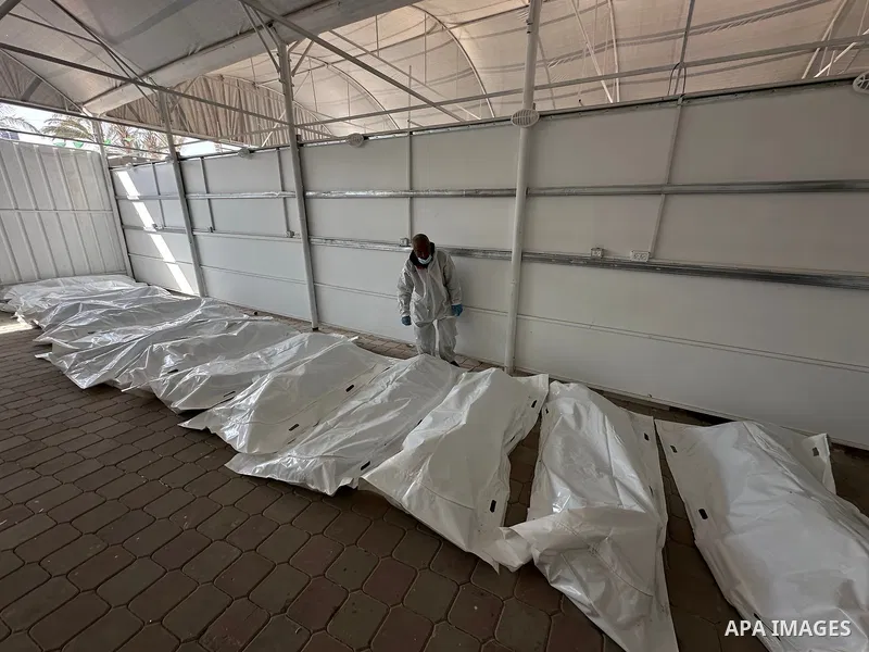 Red Cross teams deliver the bodies of 30 Palestinians, who were detained by Israeli forces from different parts of Gaza during the war and handed over as part of the ceasefire deal, to Nasser Hospital in Khan Yunis, Gaza...