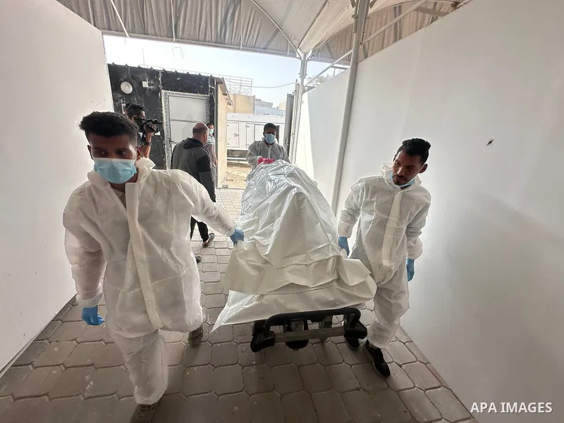 Red Cross teams deliver the bodies of 30 Palestinians, who were detained by Israeli forces from different parts of Gaza during the war and handed over as part of the ceasefire deal, to Nasser Hospital in Khan Yunis, Gaza...