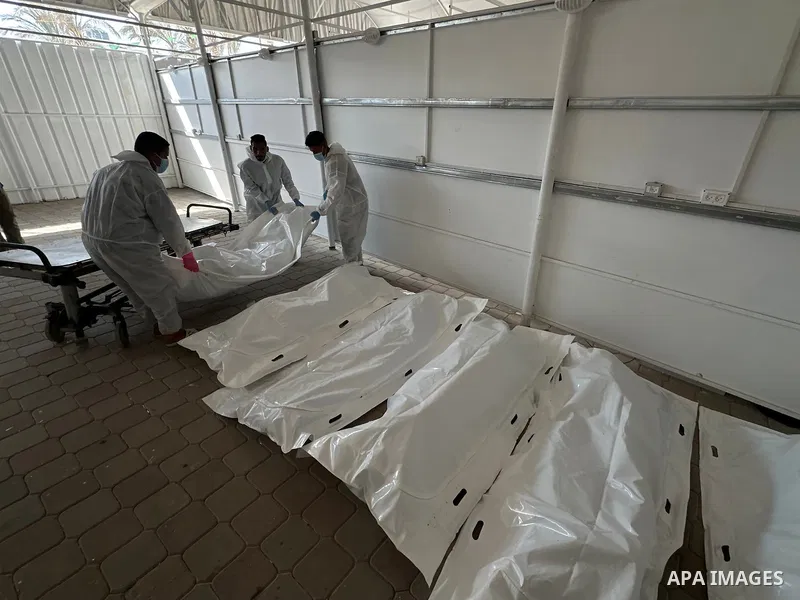 Red Cross teams deliver the bodies of 30 Palestinians, who were detained by Israeli forces from different parts of Gaza during the war and handed over as part of the ceasefire deal, to Nasser Hospital in Khan Yunis, Gaza...