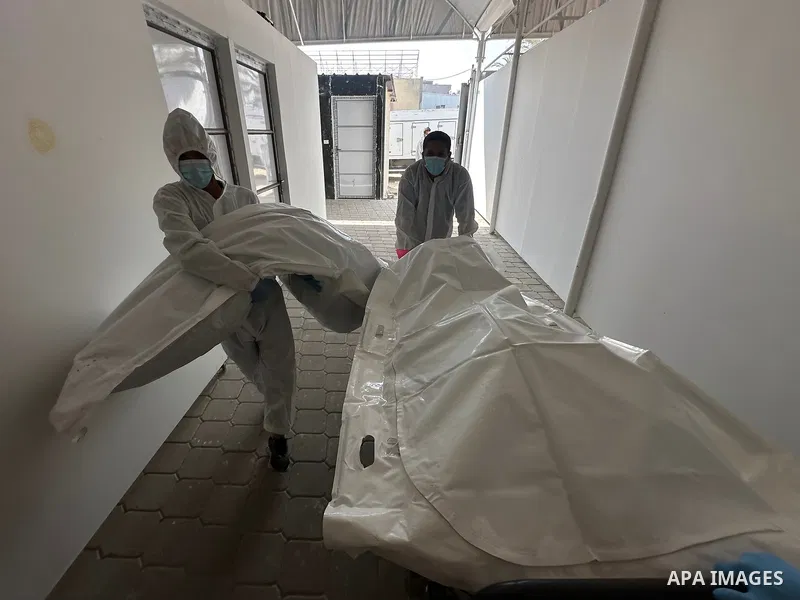 Red Cross teams deliver the bodies of 30 Palestinians, who were detained by Israeli forces from different parts of Gaza during the war and handed over as part of the ceasefire deal, to Nasser Hospital in Khan Yunis, Gaza...