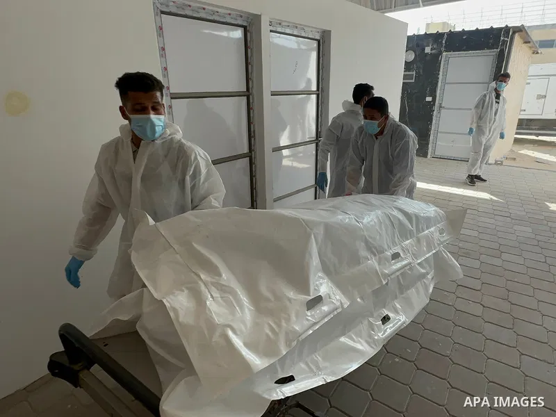 Red Cross teams deliver the bodies of 30 Palestinians, who were detained by Israeli forces from different parts of Gaza during the war and handed over as part of the ceasefire deal, to Nasser Hospital in Khan Yunis, Gaza...