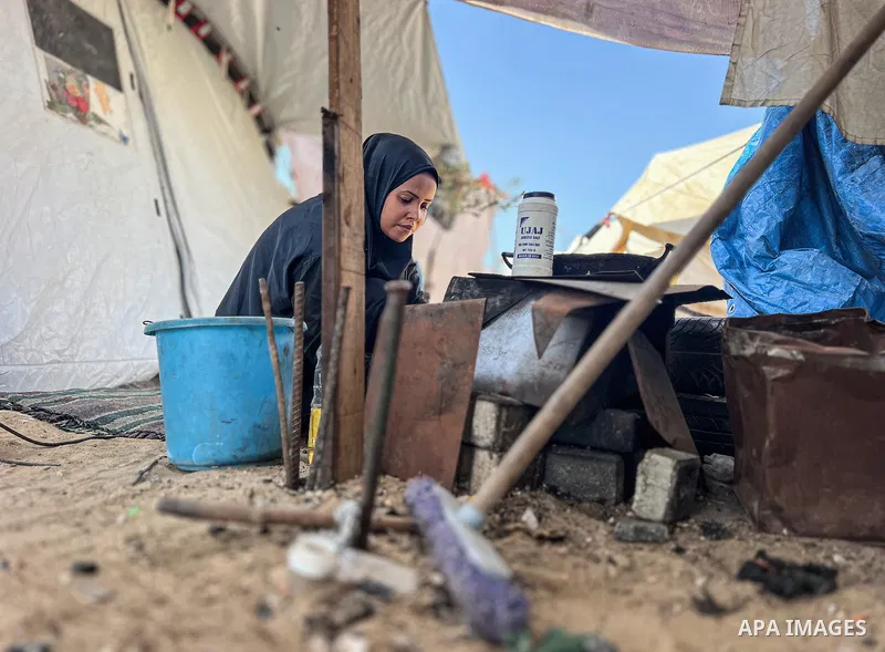 Displaced Palestinian families, including orphans, live in a temporary camp within Al-Bureij refugee camp in central Gaza, where worn-out tents have become their only shelter after losing their homes and loved ones durin...