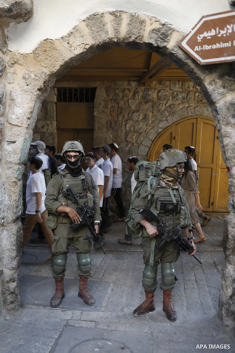 Israeli forces takes extensive security measures as Jewish settlers under Israeli military protection carried out a raid in the city of Hebron, West Bank on Nov 1 , 2025. Photo by Mamoun Wazwaz