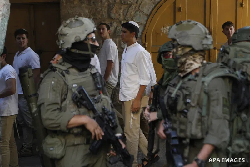 Israeli forces takes extensive security measures as Jewish settlers under Israeli military protection carried out a raid in the city of Hebron, West Bank on Nov 1 , 2025. Photo by Mamoun Wazwaz