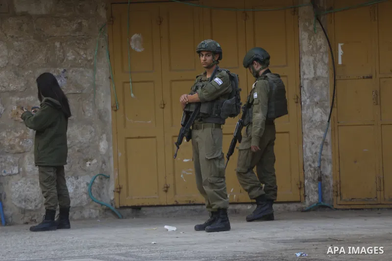Israeli forces takes extensive security measures as Jewish settlers under Israeli military protection carried out a raid in the city of Hebron, West Bank on Nov 1 , 2025. Photo by Mamoun Wazwaz
