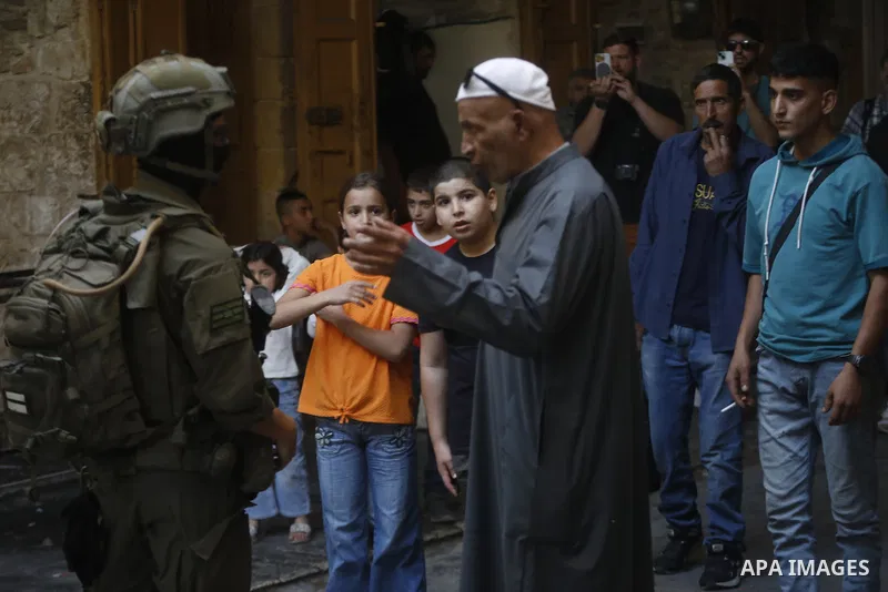 Israeli forces takes extensive security measures as Jewish settlers under Israeli military protection carried out a raid in the city of Hebron, West Bank on Nov 1 , 2025. Photo by Mamoun Wazwaz