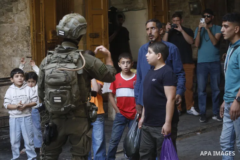 Israeli forces takes extensive security measures as Jewish settlers under Israeli military protection carried out a raid in the city of Hebron, West Bank on Nov 1 , 2025. Photo by Mamoun Wazwaz
