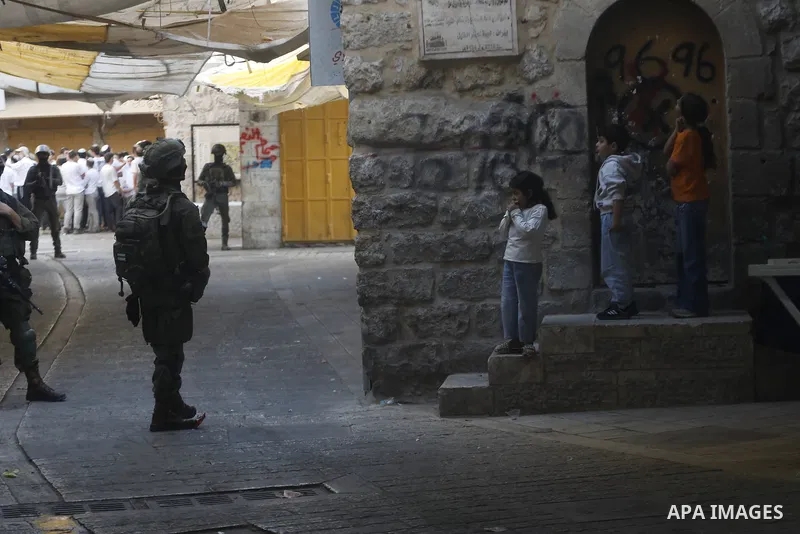 Israeli forces takes extensive security measures as Jewish settlers under Israeli military protection carried out a raid in the city of Hebron, West Bank on Nov 1 , 2025. Photo by Mamoun Wazwaz