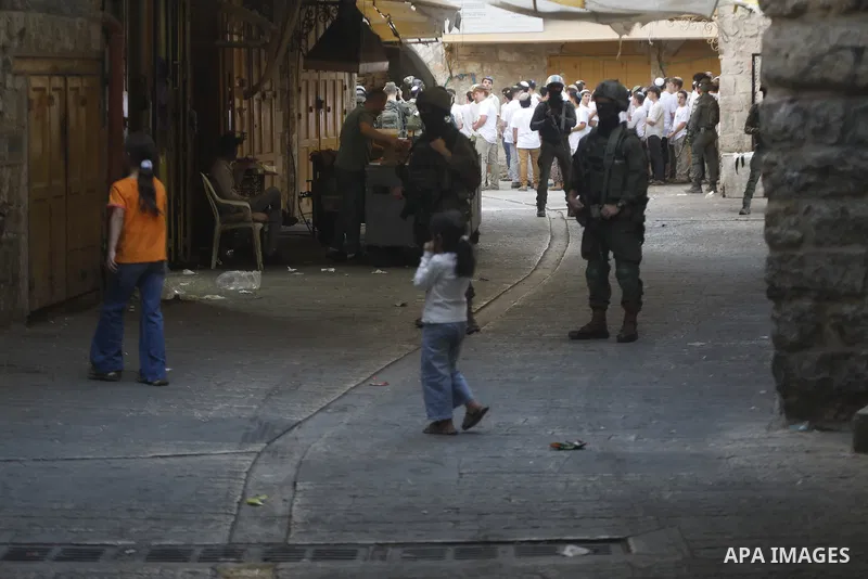 Israeli forces takes extensive security measures as Jewish settlers under Israeli military protection carried out a raid in the city of Hebron, West Bank on Nov 1 , 2025. Photo by Mamoun Wazwaz