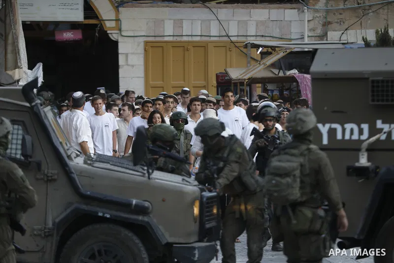 Israeli forces takes extensive security measures as Jewish settlers under Israeli military protection carried out a raid in the city of Hebron, West Bank on Nov 1 , 2025. Photo by Mamoun Wazwaz