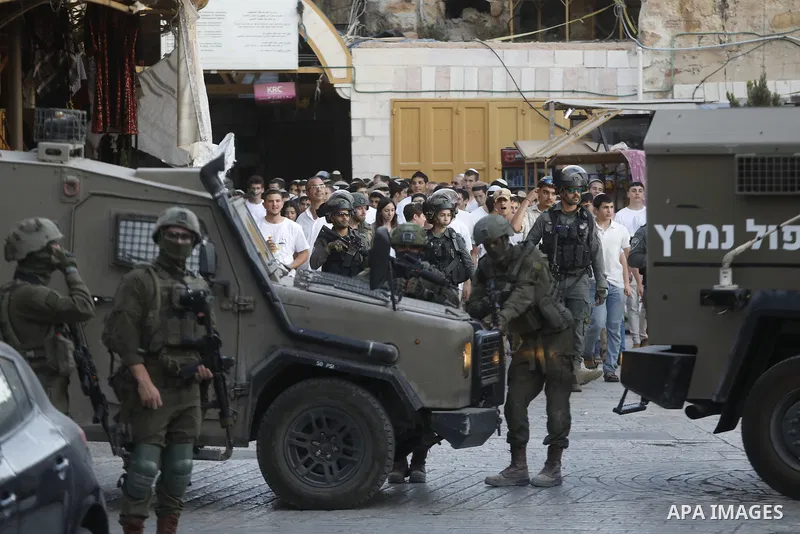 Israeli forces takes extensive security measures as Jewish settlers under Israeli military protection carried out a raid in the city of Hebron, West Bank on Nov 1 , 2025. Photo by Mamoun Wazwaz