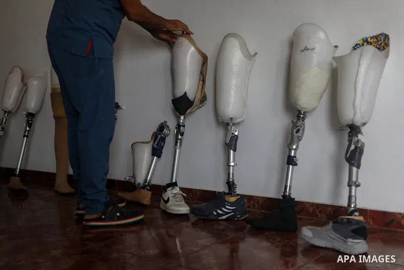 Palestinians, including children, receive rehabilitation sessions using prosthetic limbs at Hamad Hospital for Rehabilitation, after losing limbs during the Israeli war in Al-Zawayda in the central Gaza Strip on November...