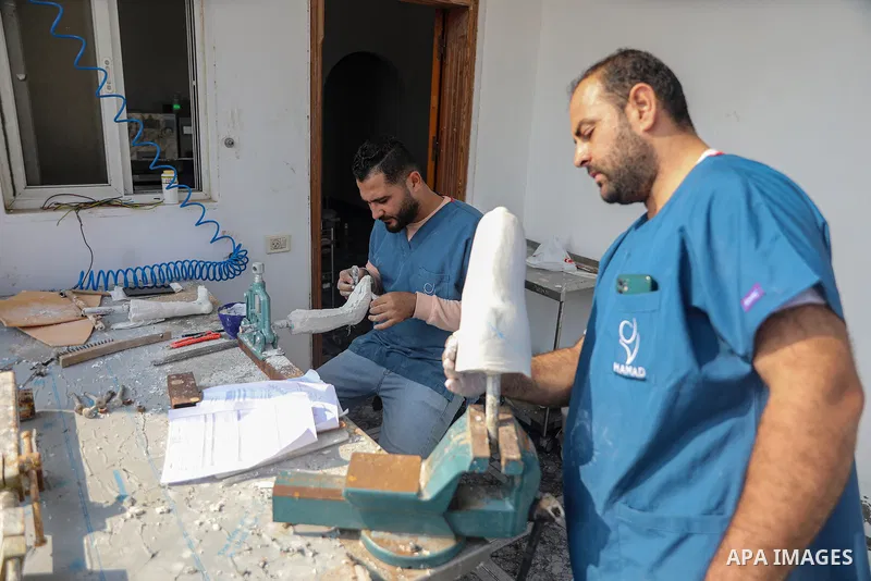 Palestinians, including children, receive rehabilitation sessions using prosthetic limbs at Hamad Hospital for Rehabilitation, after losing limbs during the Israeli war in Al-Zawayda in the central Gaza Strip on November...