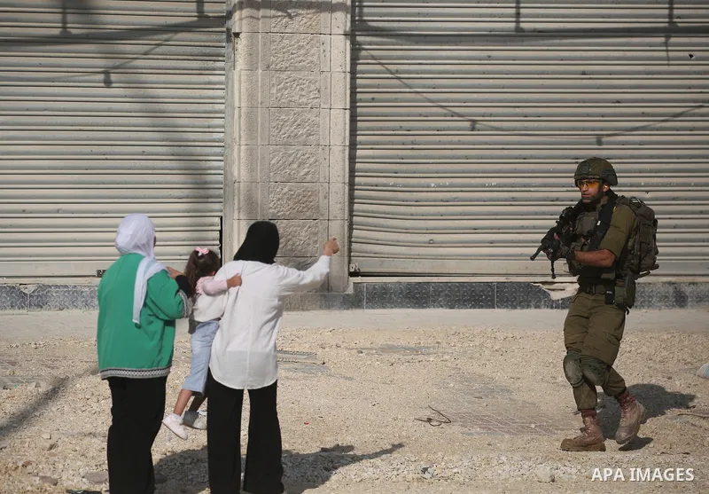 Displaced Palestinians stage a protest at the entrance to the Nur Shams refugee camp in the West Bank, calling for their right to return to their homes in Tulkarm. Israeli forces block the demonstration and detain severa...