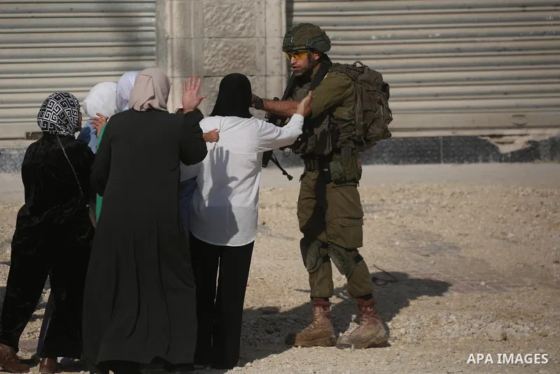 Displaced Palestinians stage a protest at the entrance to the Nur Shams refugee camp in the West Bank, calling for their right to return to their homes in Tulkarm. Israeli forces block the demonstration and detain severa...