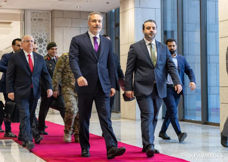 Syrian President Ahmed al-Sharaa meets with Turkish Foreign Minister Hakan Fidan in Damascus, in the presence of several officials from both countries. Damascus, Syria, on December 22, 2025. Photo by Syrian Presidency\ a...