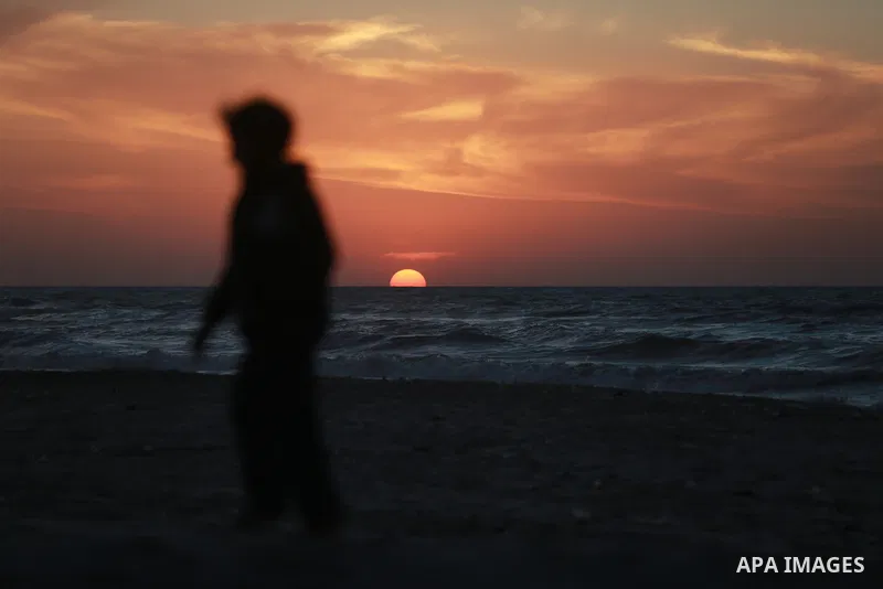 Palestinians remain hopeful for a permanent ceasefire, writing the number "2026" in the sand on the Gaza City beach as the sun set on the last day of 2025 and the first night of the new year arrived. Gaza City, December...