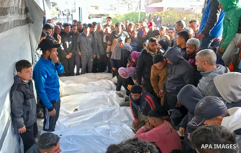 Palestinians mourn death of their loved ones after Israeli forces targeted a tent sheltering displaced civilians with a drone in the Esda area of Khan Yunis in the southern Gaza Strip on January 31, 2026. According to re...