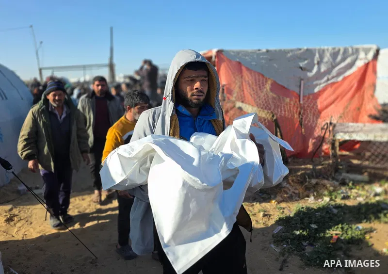 Palestinians mourn death of their loved ones after Israeli forces targeted a tent sheltering displaced civilians with a drone in the Esda area of Khan Yunis in the southern Gaza Strip on January 31, 2026. According to re...