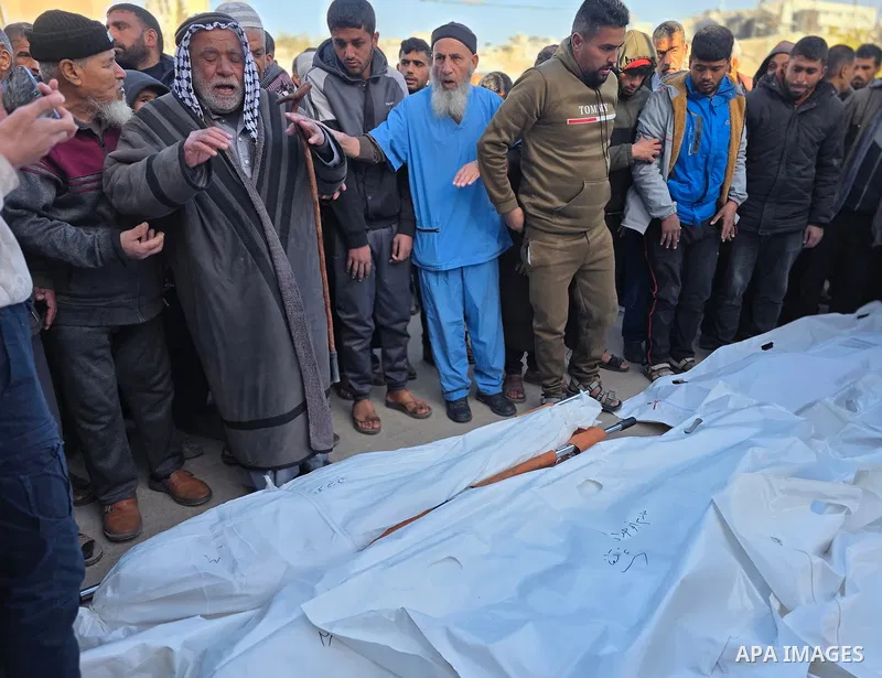 Palestinians mourn death of their loved ones after Israeli forces targeted a tent sheltering displaced civilians with a drone in the Esda area of Khan Yunis in the southern Gaza Strip on January 31, 2026. According to re...