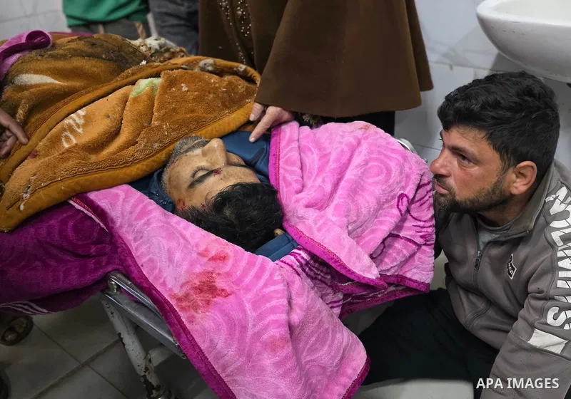 Palestinians mourn death of their loved ones after Israeli forces targeted a tent sheltering displaced civilians with a drone in the Esda area of Khan Yunis in the southern Gaza Strip on January 31, 2026. According to re...