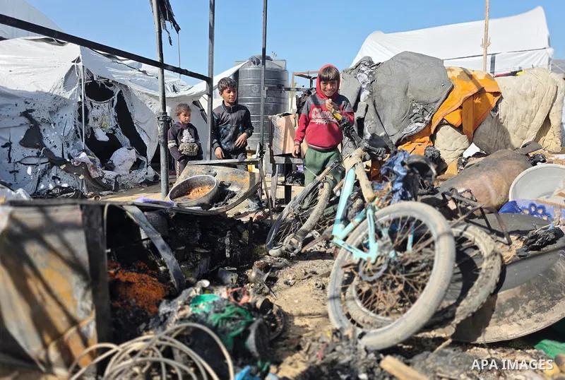Palestinians inspect the site of an Israeli strike on tents on Saturday, in Khan Younis, in the southern Gaza Strip, January 31, 2026. Photo by Tariq Mohammad\ APA Images