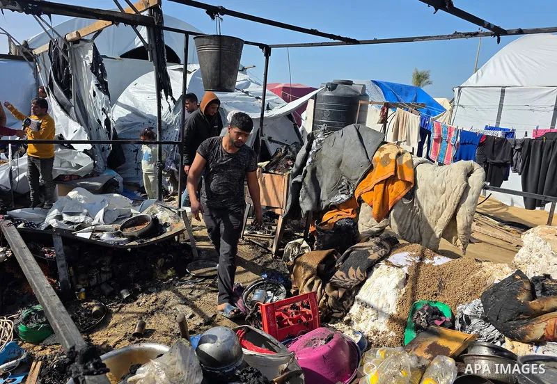 Palestinians inspect the site of an Israeli strike on tents on Saturday, in Khan Younis, in the southern Gaza Strip, January 31, 2026. Photo by Tariq Mohammad\ APA Images