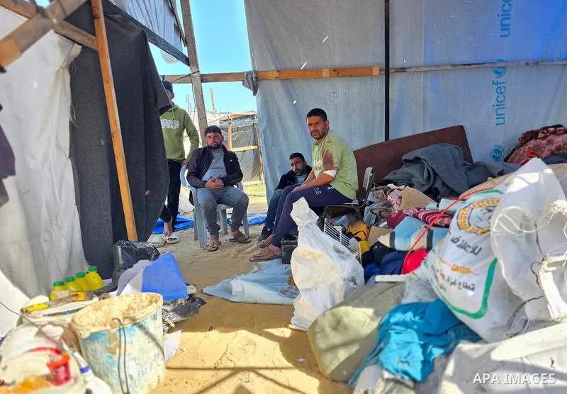 Palestinians inspect the site of an Israeli strike on tents on Saturday, in Khan Younis, in the southern Gaza Strip, January 31, 2026. Photo by Tariq Mohammad\ APA Images