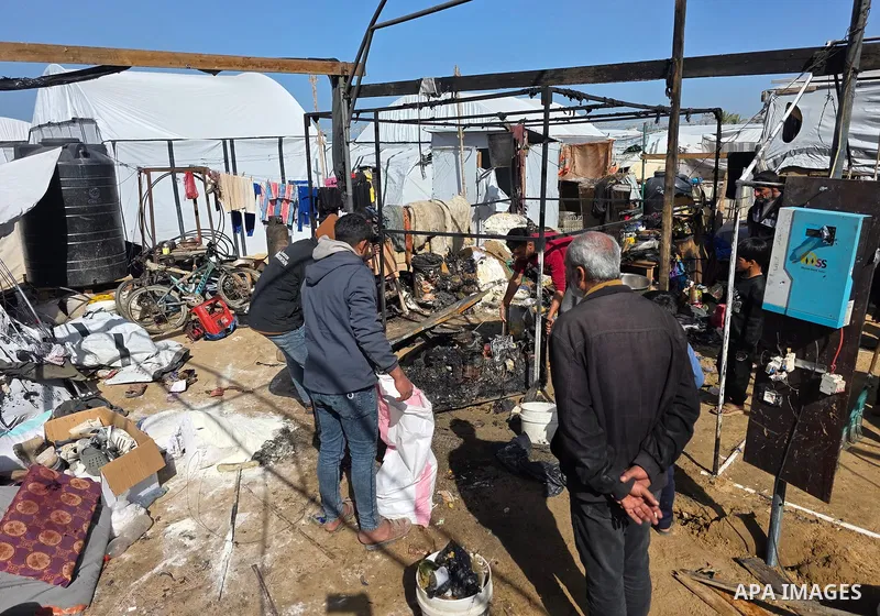 Palestinians inspect the site of an Israeli strike on tents on Saturday, in Khan Younis, in the southern Gaza Strip, January 31, 2026. Photo by Tariq Mohammad\ APA Images