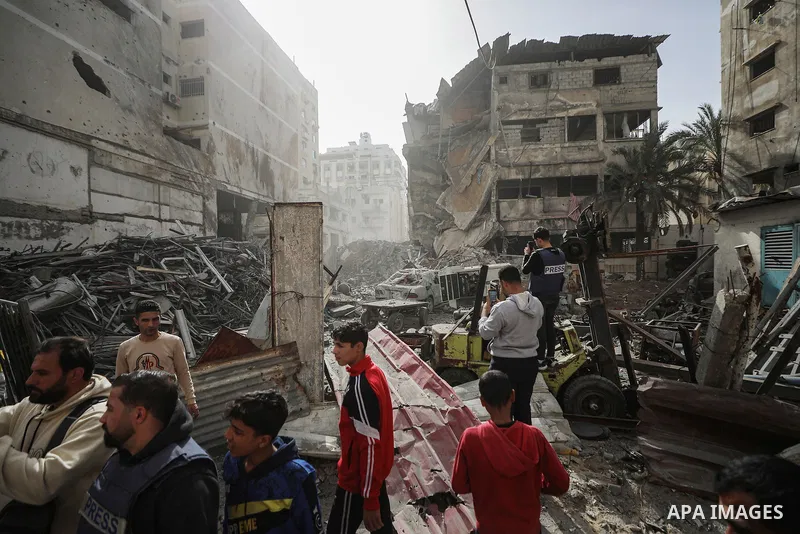 Palestinians inspect the damaged and largely destroyed building after the Israeli army targeted it in Nasser neighborhood of Gaza City, Gaza on January 31, 2026. At least 29 Palestinians were killed at dawn on Saturday i...