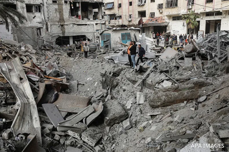 Palestinians inspect the damaged and largely destroyed building after the Israeli army targeted it in Nasser neighborhood of Gaza City, Gaza on January 31, 2026. At least 29 Palestinians were killed at dawn on Saturday i...