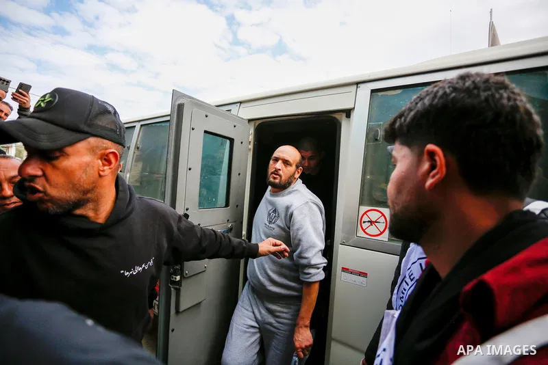 Eleven Palestinian prisoners released from Israeli prisons arrived at Al-Aqsa Martyrs Hospital in Deir al-Balah, in the central Gaza Strip, on March 23, 2026, in vehicles belonging to the International Committee of the R...