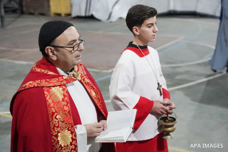 Gazan Christians gather at the Church of the Holy Family to attend a service on 'Good Friday,' the day commemorating the crucifixion of Jesus Christ in Gaza City, Palestine on April 3, 2026. Those attending the service l...