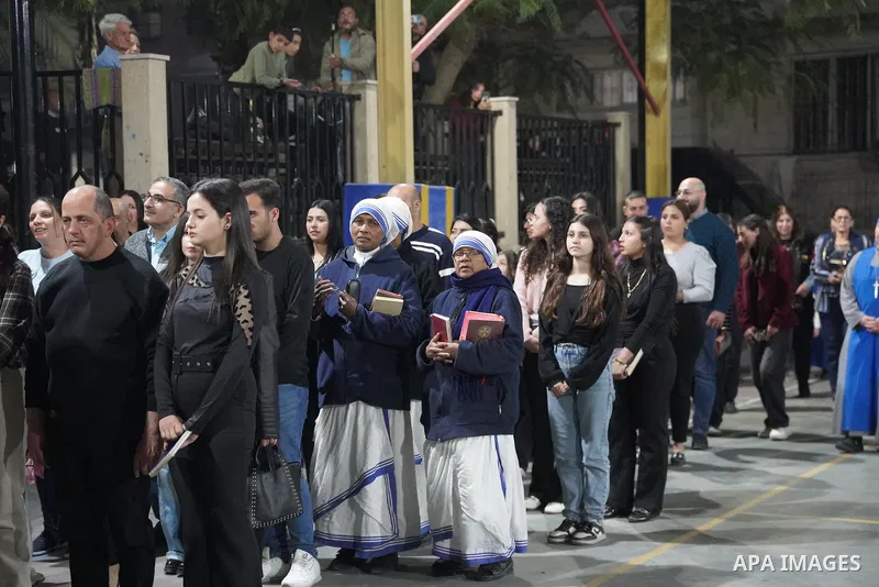 Gazan Christians gather at the Church of the Holy Family to attend a service on 'Good Friday,' the day commemorating the crucifixion of Jesus Christ in Gaza City, Palestine on April 3, 2026. Those attending the service l...