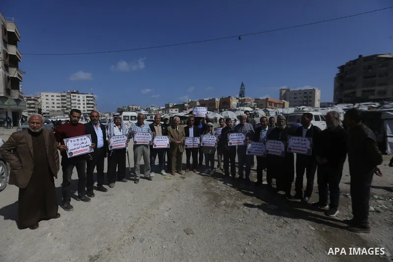 Families of Palestinian prisoners participate in a protest in front of the International Committee of the Red Cross (ICRC) headquarters in Gaza City, demanding the release of their relatives from Israeli prisons and expr...
